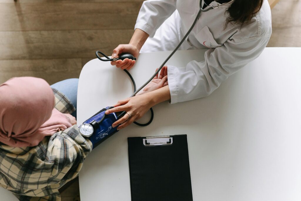 Doctor taking vitals of patient