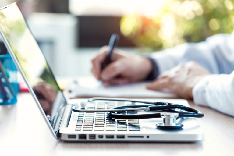 medical-stethoscope-on-laptop-keyboard-2024-09-22-18-35-01-utc_hzsl1x-Dz78NM