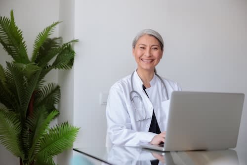 asian-woman-medical-worker-smiling-at-camera-2025-03-13-12-20-21-utc_mr8qc9-fiRm6q