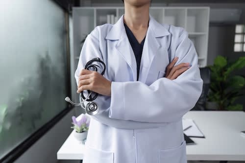 confident-female-doctor-in-white-coat-with-stethos-2025-01-16-13-30-42-utc_md7ozb-hFVdfh