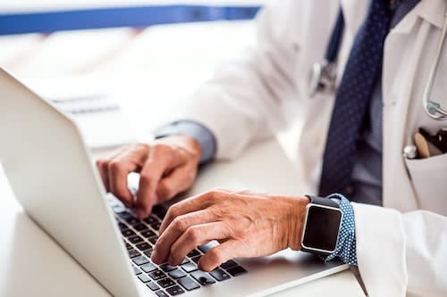 senior-doctor-with-laptop-working-at-the-office-de-2026-01-05-06-22-15-utc_ijw4jn-LKNiOM