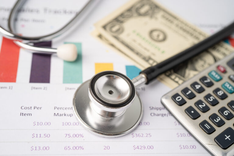 stethoscope-and-us-dollar-banknotes-on-chart-or-gr-2025-02-25-17-29-20-utc_uw3j41-nXyylc